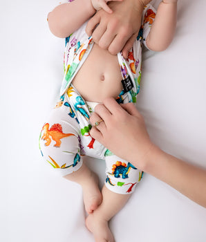 Change-A-Roo™ Front Opening Shortie Romper in OG Prehistoric Pals