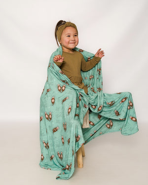 Blanket in Otters | Bamboo Viscose