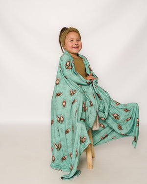 Blanket in Otters | Bamboo Viscose