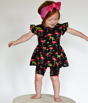 Switch-A-Roo™ Reversible Opening Twirl Shortie Romper in Flamingos