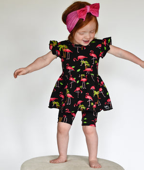 Switch-A-Roo™ Reversible Opening Twirl Shortie Romper in Flamingos
