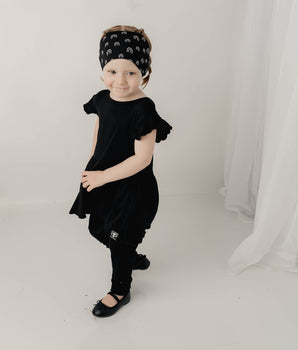 Switch-A-Roo™ Reversible Opening Twirl Romper in Jet Black