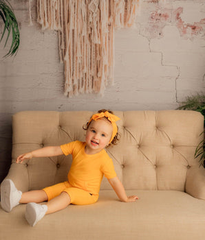 Front Opening Shortie Romper in Mango
