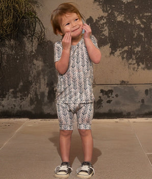 Front Opening Shortie Romper in Green Arrows