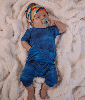 Change-A-Roo™ Front Opening Shortie Romper in Marbled Sapphire