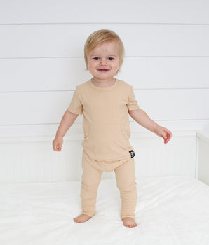 Change-A-Roo™ Front Opening Romper in Beige