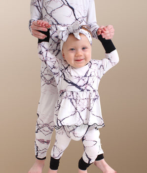 Front Opening Twirl Romper in Marbled Bianco