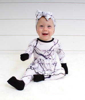 Front Opening Twirl Romper in Marbled Bianco