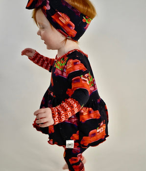 Front Opening Twirl Romper in Loads of Love